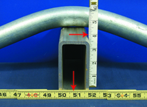 <p>Question 28</p><p>A three-bend saddle in a piece of 1 1/4-inch RMC is to be fabricated to clear the obstruction shown. The conduit will be coupled to another piece of conduit on the left, from which the horizontal measurement is being taken.</p><p>Calculate the distance to Mark 1 to make this saddle, using a 45°center bend, and a multiplier of 2.6. Hint: Rise = 4 inches. Note: The values calculated for this question may be used for additional questions. (Round the answer to the nearest eighth inch. Answer the question in the form of a decimal.)</p><p></p><p>Distance to Mark 1 = ?</p>