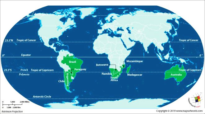 <p>The tropics are located </p>